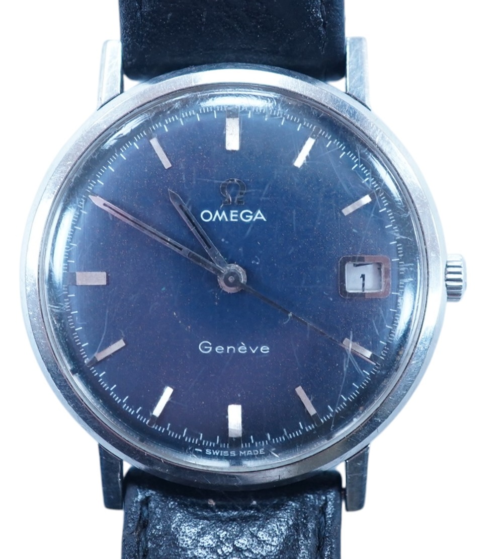 A gentleman's late 1960's stainless steel Omega manual wind wrist watch, with baton numerals and date aperture, movement c.613, case diameter 34mm, on a later associated leather strap. Condition - poor to fair